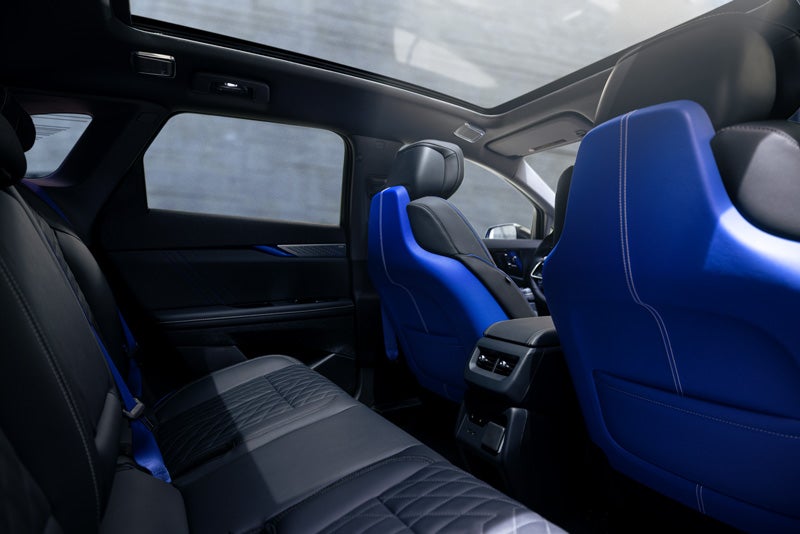 Back Seat View of the 2026 OPTIQ-V Blue Front Seats, Sun Roof, and Interior | C. Harper Cadillac in Belle Vernon PA